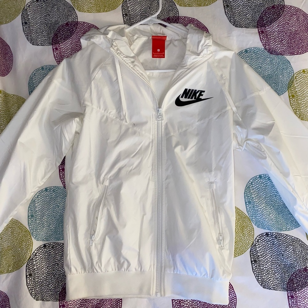 White wind breaker with hoodie.